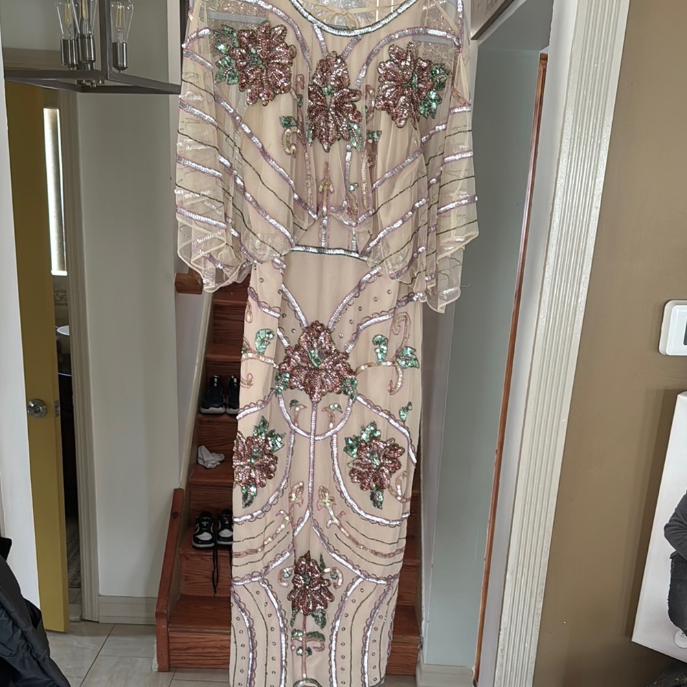 Elegant Beaded Gown with Floral Embellishments